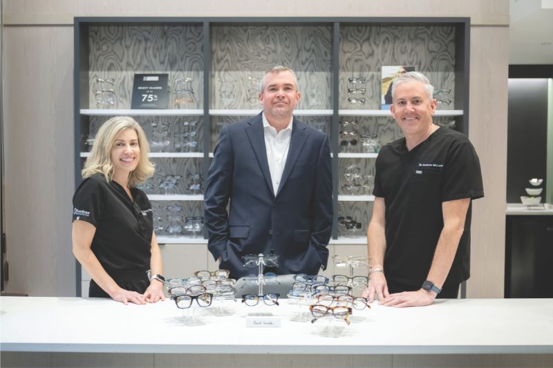 Leader Bank Vice President and Commercial Loan Officer Kevin McSweeney (top center) with Forefront Eye Care Co-Owners Dr. Amy Nau (top left) and Dr. Andrew McLeod (top right) at the business’s new location.