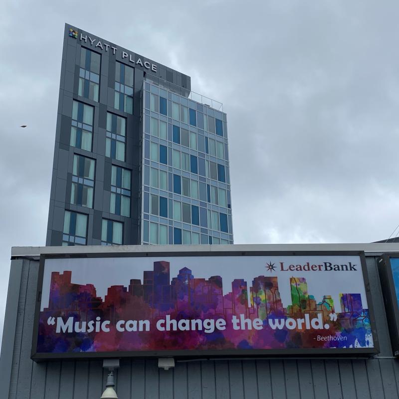 Leader Bank Pavilion sign stating, “Music can change the world.” - Beethoven